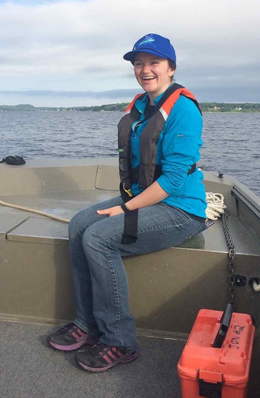 Rachel Ratliff on a jon boat on Muskegon Lake